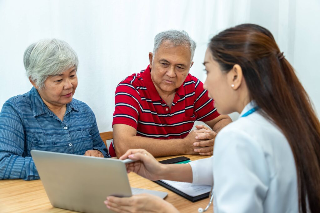 doctor educating Filipino diabetes patients